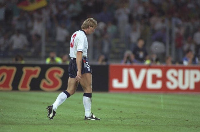 A dejected Stuart Pearce walks away after missing his penalty during the 1990 World Cup semi-fina against Germany in Turin