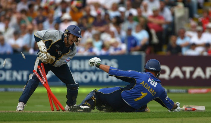 Geraint Jones, the Kent Spitfires wicketkeeper, runs out theSussex Sharks batsman Chris Adams during last season's Twenty20 Cup finals day at Edgbaston