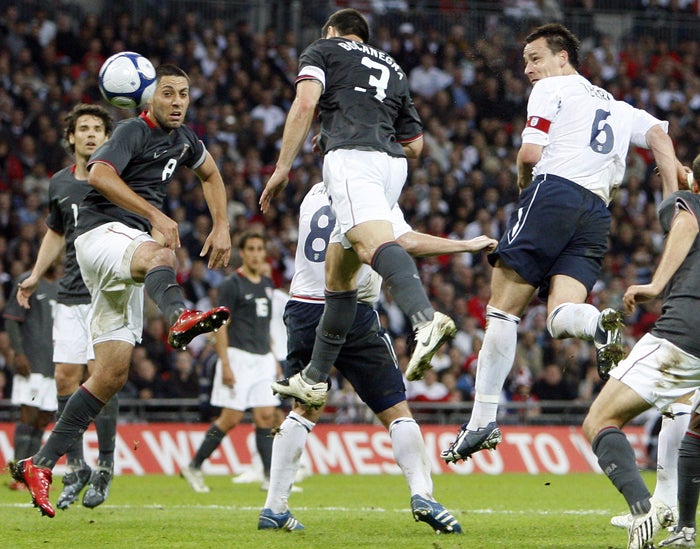 England captain John Terry opens the scoring against the United States at Wembley last night
