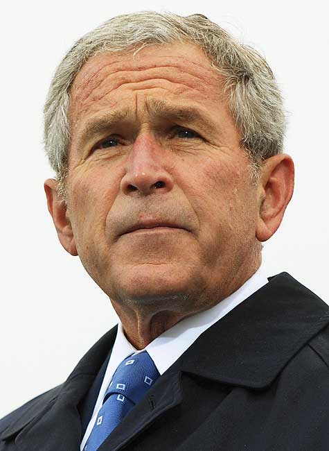George Bush has warned Iran that military action is still &quot;on the table&quot;