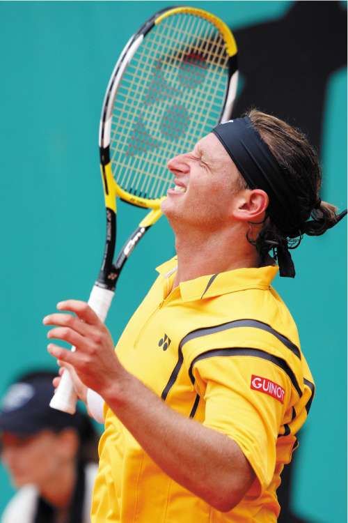 David Nalbandian shows his dismay during his defeat by Jeremy Chardy at Roland Garros yesterday