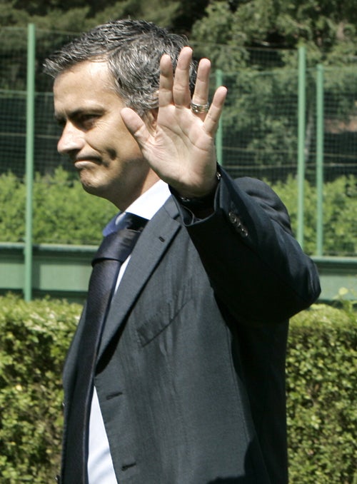 Mourinho arrives for his first meeting with the Italian media yesterday