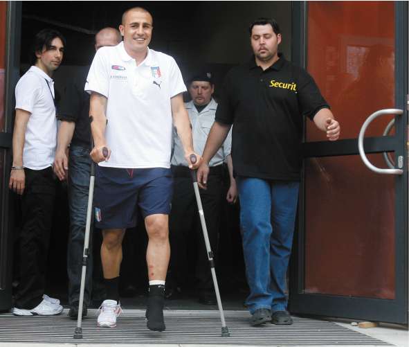 The Italy captain leaves the Azzurri headquarters on crutches after being ruled out of the European Championship with an ankle injury