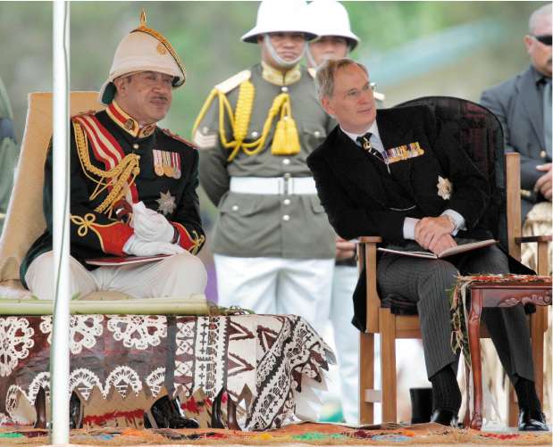 George Tupou V (left) talks with the Duke of Gloucester at his father's funeral in Tonga in 2006