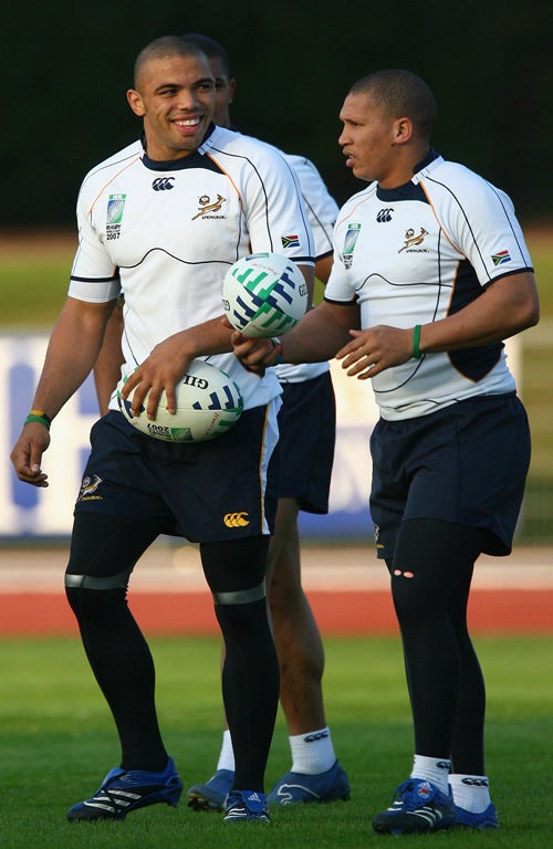 Scrum-half Ricky Januarie (right) has been dropped for disciplinary reasons