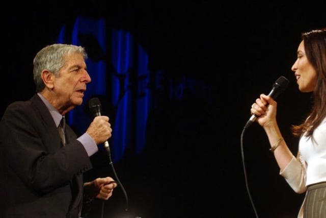 Cohen sings with his partner Anjani Thomas last year © AP