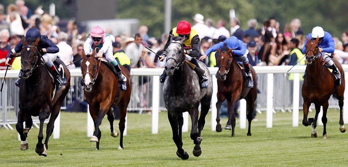 Yeats (left) is driven out by Johnny Murtagh to win his third consecutive Gold Cup at Royal Ascot yesterday from Geordieland (centre)