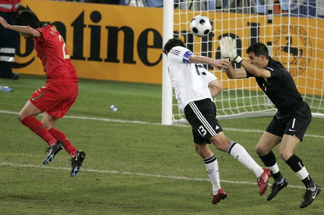 Ballack (centre) scores to put Germany back in control last night