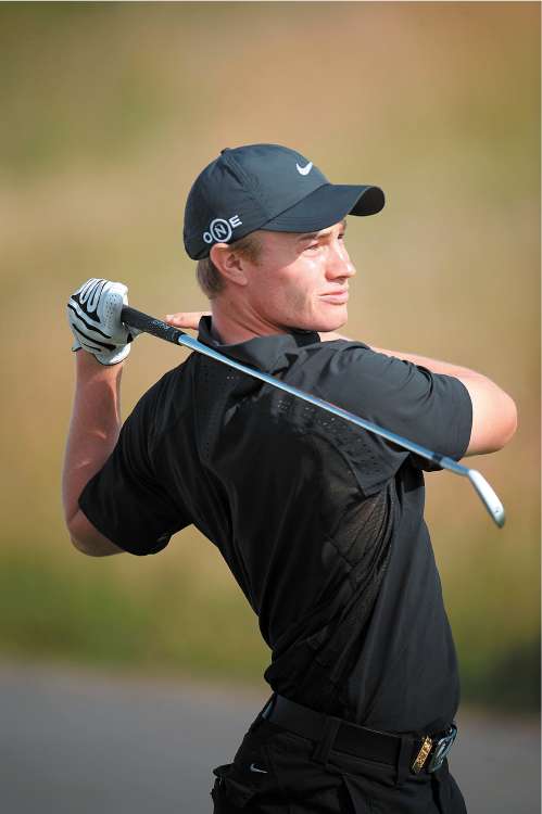 Fisher watches a drive on the first day of the French Open