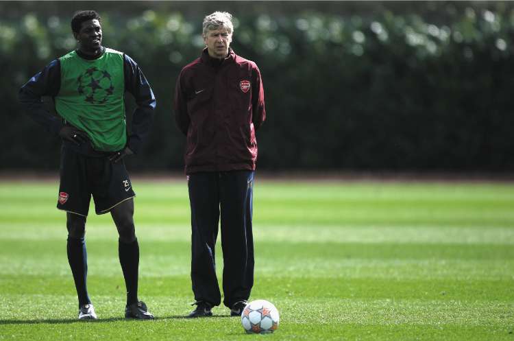 Emmanuel Adebayor (left) sees Arsène Wenger as a father figure but may yet leave him