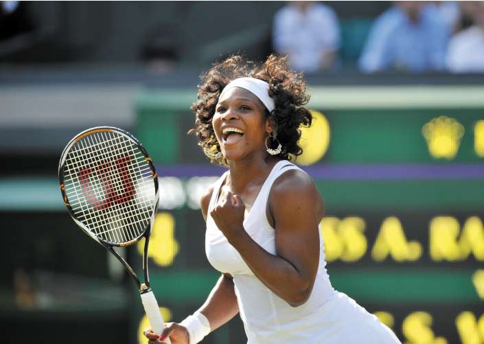 Serena Williams celebrates her crushing 6-4, 6-0 quarter-final victory over Poland's Agnieszka Radwanska yesterday