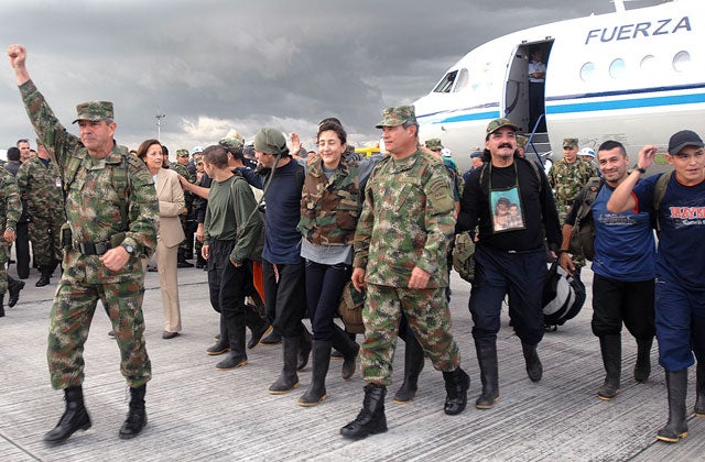 Ingrid Betancourt arriving with her rescuers in Bogota yesterday