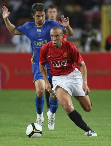 Mikaël Silvestre, in action during pre-season against Portsmouth,saw his chances limited at Manchester United