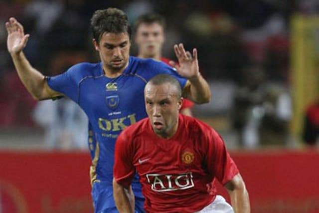 Mikaël Silvestre, in action during pre-season against Portsmouth,saw his chances limited at Manchester United
