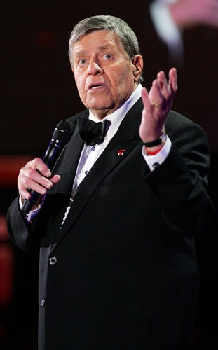 The entertainer was no stranger to appearing on stage in a tuxedo