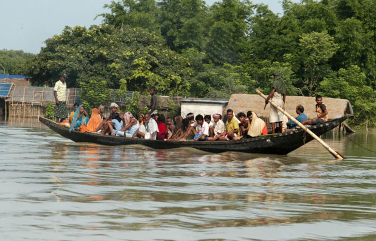 Hundreds of thousands stranded by India floods | The Independent | The ...