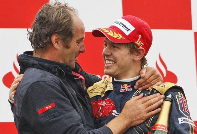 Gerhard Berger congratulates his young Italian Grand Prix-winning driver, Sebastian Vettel