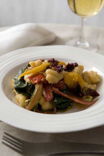 Add the pasta to the cooked vegetables and toss through