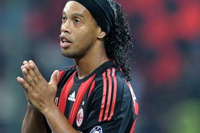 One problem that Milan face is that Kaka and fellow Brazilian Ronaldinho (above) have not gelled as twin three-quarter players behind the striker in coach Carlo Ancelotti's favoured 4-3-2-1 formation