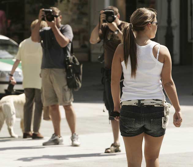 Coleen McLoughlin (now Rooney) gets papped in Baden-Baden in 2006 (Getty)