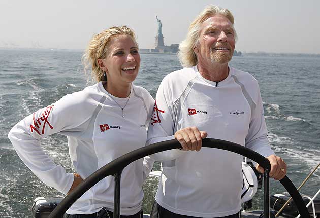 Sir Richard Branson and his daughter Holly sailing on 'Virgin Money' in New York harbour