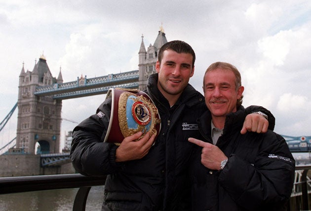 Under Enzo’s guidance, Joe retired unbeaten after 46 wins and held world titles in two weight classes (Getty)