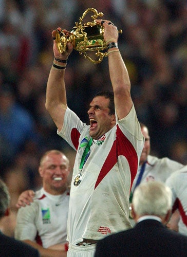 Martin Johnson lifts the trophy