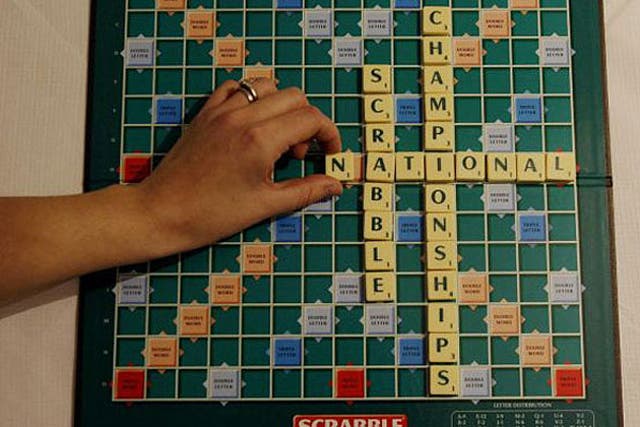 A Scrabble player has been thrown out of the US national championship tournament after being caught hiding blank letter tiles