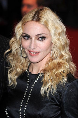 Madonna today accepted substantial undisclosed damages for privacy and infringement of copyright