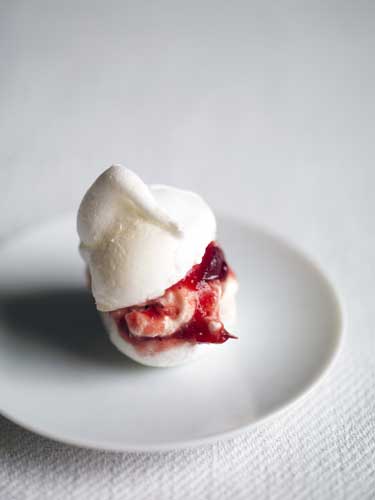 To serve, cut the meringues in half and spoon a little of the cream on first then the cranberry sauce.