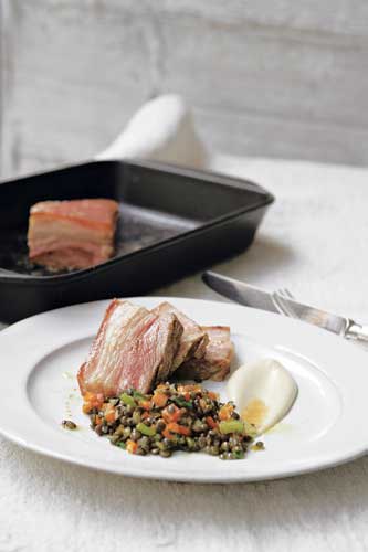 Serve the pork carved thickly, with the purée and lentils