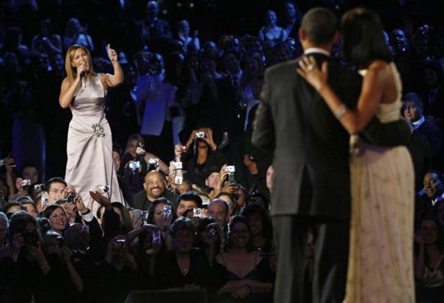Beyoncé sings 'At Last', the Etta James song, for President Barack Obama and Michelle at their first dance during the Neighborhood Inaugural Ball