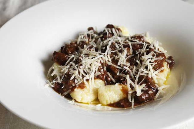 Serve in warmed pasta bowls or plates with the sauce spooned over the gnocchi