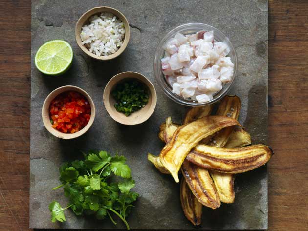 Arrange the fish with the juice in individual bowls or a large one to share with the plantain in a basket