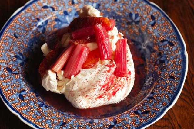 Spoon the crème fraiche into the meringue and spoon the rhubarb mixture over