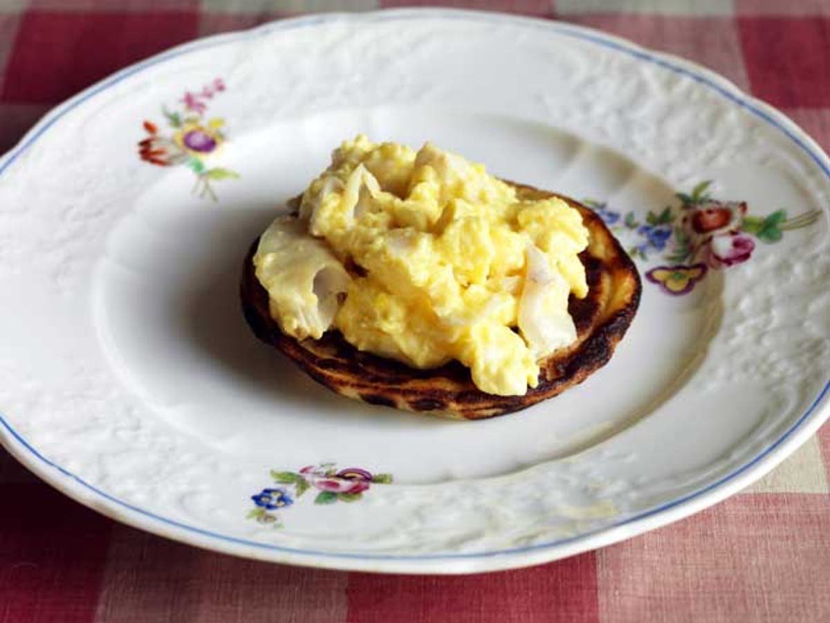 Potato pancakes with scrambled eggs and smoked haddock The
