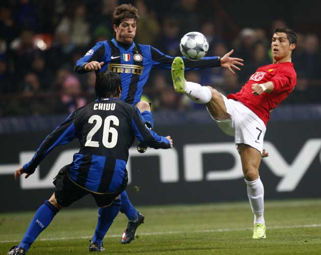 Davide Santon challenges for the ball with Cristiano Ronaldo back in his first spell with Inter