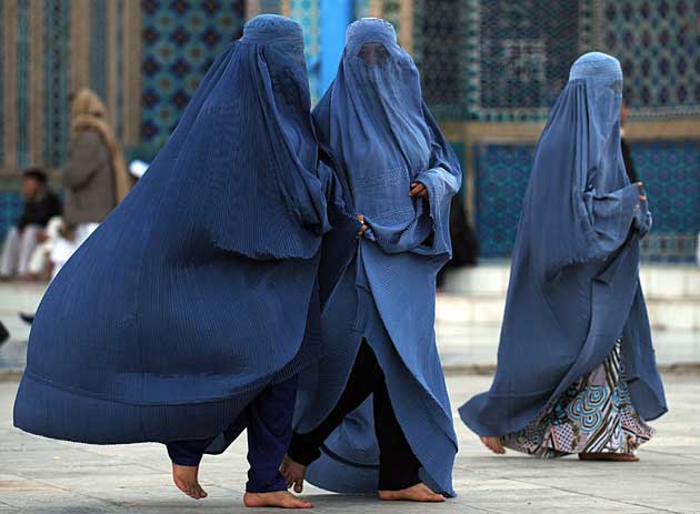 Afghan women pictured taking a walk