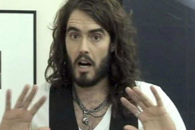 <p>Russell Brand during a statement in which he announced his resignation from his Radio 2 show</p>