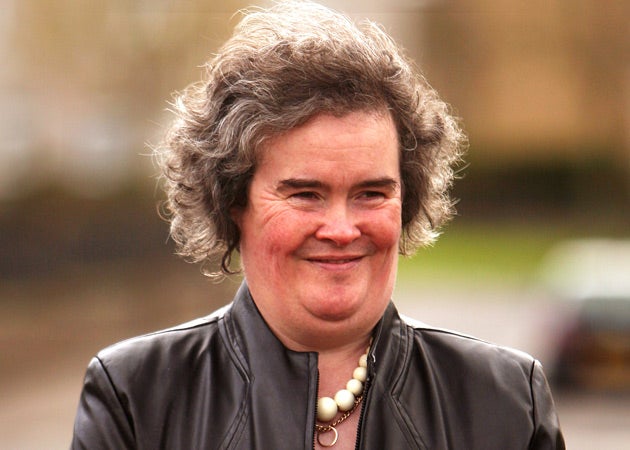 Britain's Got Talent star Susan Boyle was mobbed as she headed to Los Angeles to make her US debut for a high-profile TV appearance.