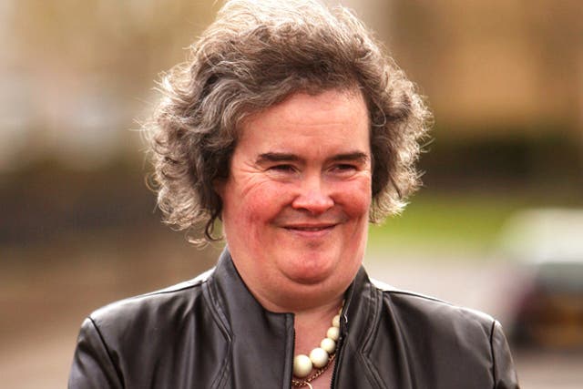 Britain's Got Talent star Susan Boyle was mobbed as she headed to Los Angeles to make her US debut for a high-profile TV appearance.