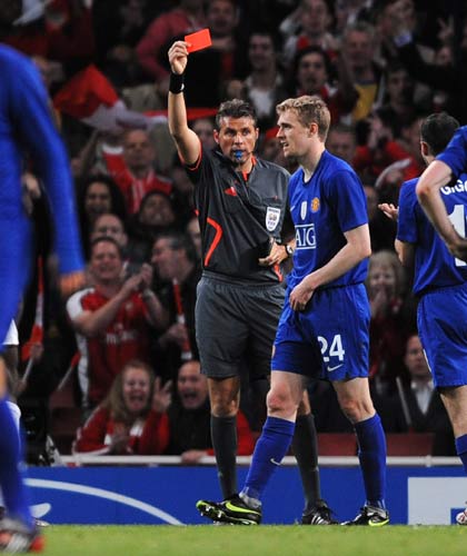 United's Darren Fletcher is sent off byreferee Roberto Rosetti