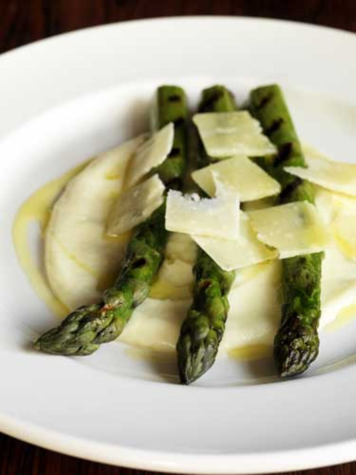 Grilled asparagus with creamed Jersey Royals and shaved Parmesan The