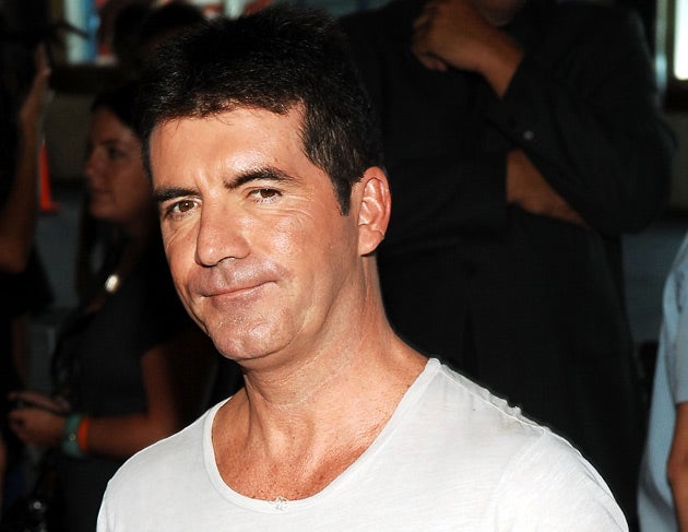 The record, masterminded by music supremo Simon Cowell to help Haiti earthquake victims, has topped the 200,000 sales mark in just two days.