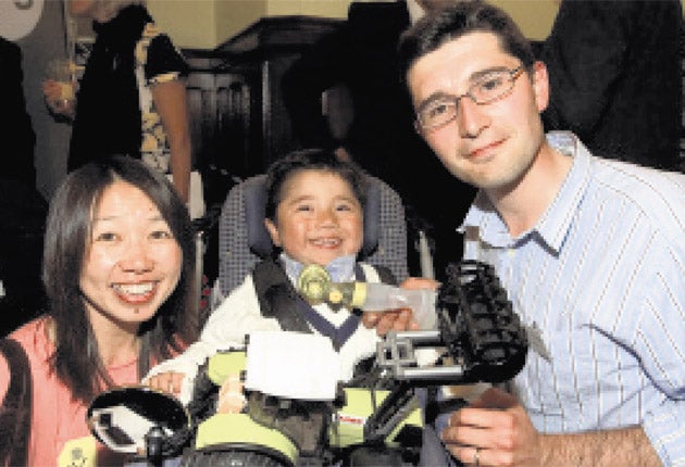 Neil and Kazumi Puttick with son Sam, five, who died before they jumped off cliffs at Beachy Head