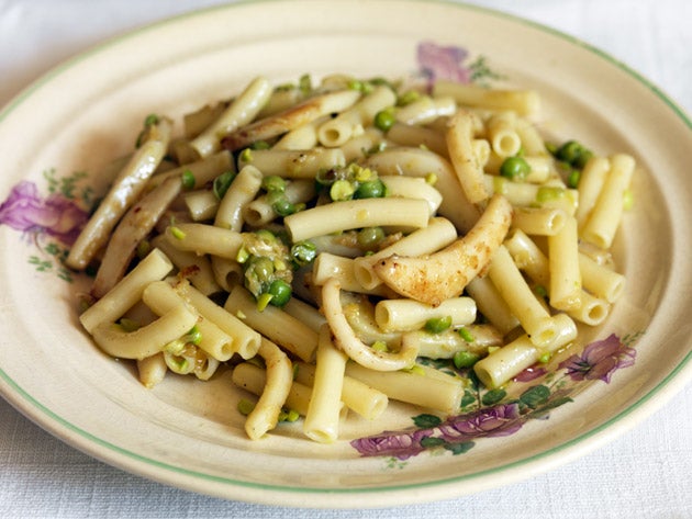Mix the pasta with the peas, cuttlefish, sauce and pea shoots and serve immediately