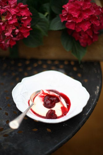 To serve, scoop the cream out into individual dishes and spoon the fruit on top