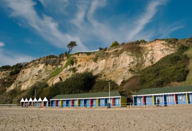 Beach huts and blue sky at Canford Cliffs, Dorset