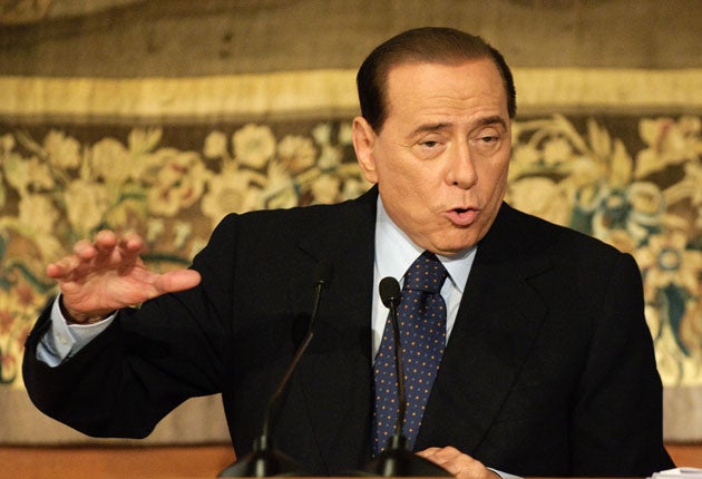 Prime Minister Silvio Berlusconi's control of Italian television came under fresh scrutiny yesterday after the prime-time line-up of both state and private networks was changed to give him the spotlight.