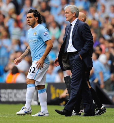 Tevez left United and joined rivals Manchester City